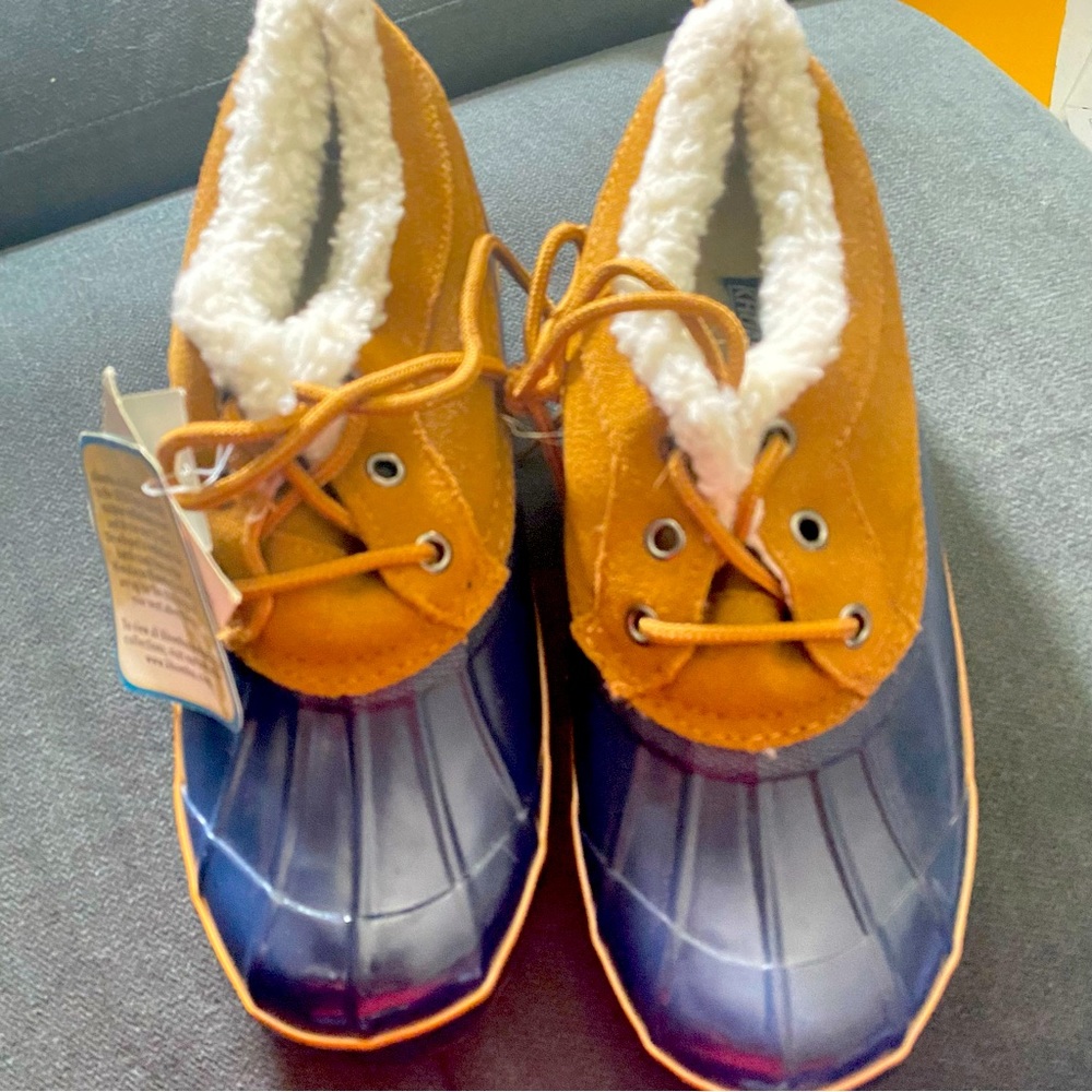 Rain boots/snow boots dark blue clean in the inside next worn tan size 10